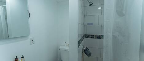 Hair dryer, towels, soap, toilet paper