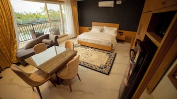 Royal Studio Suite, Smoking, Balcony | In-room safe, desk, laptop workspace, iron/ironing board