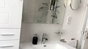 Hair dryer, towels, toilet paper