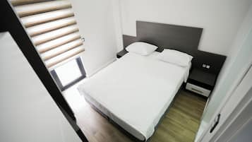 Habitación doble Deluxe, vista a la ciudad | Escritorio, espacio para trabajar con laptop y wifi gratis