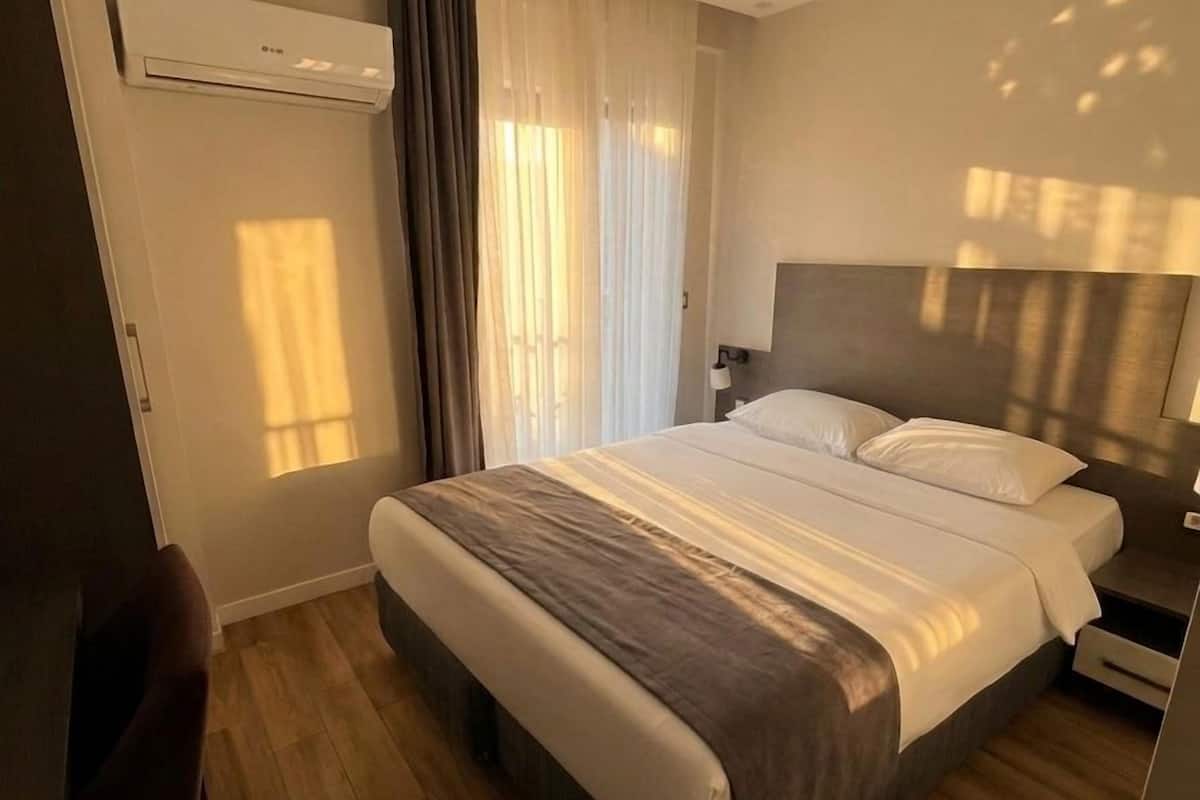 Deluxe Double Room, City View | Desk, laptop workspace, free WiFi