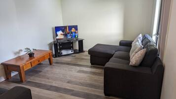 Ferienhaus, 4 Schlafzimmer, barrierefrei, Gartenblick | Wohnzimmer