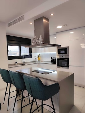 Departamento Confort, vista a la playa | Área de sala de estar