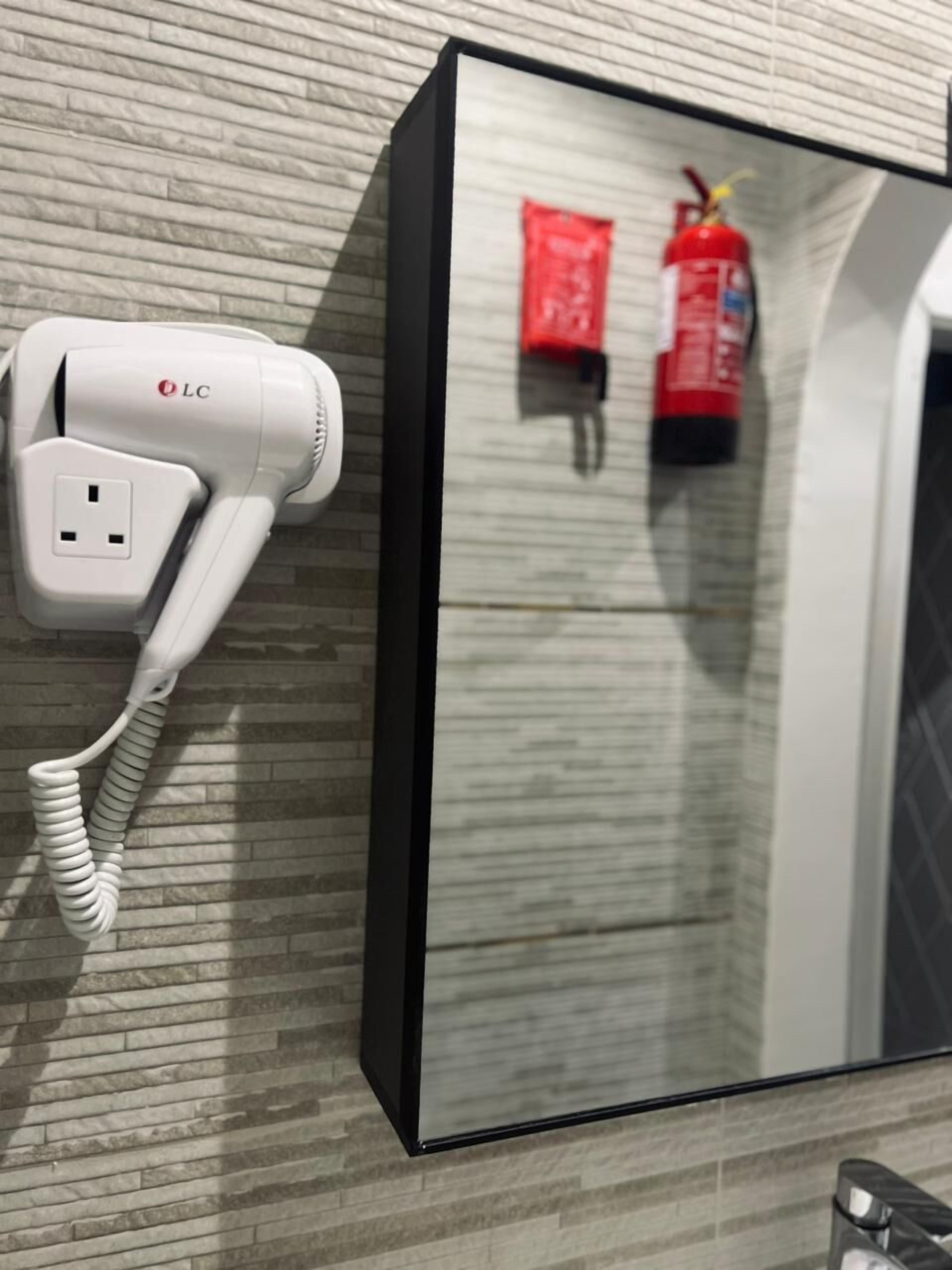 Shower, free toiletries, hair dryer, bathrobes