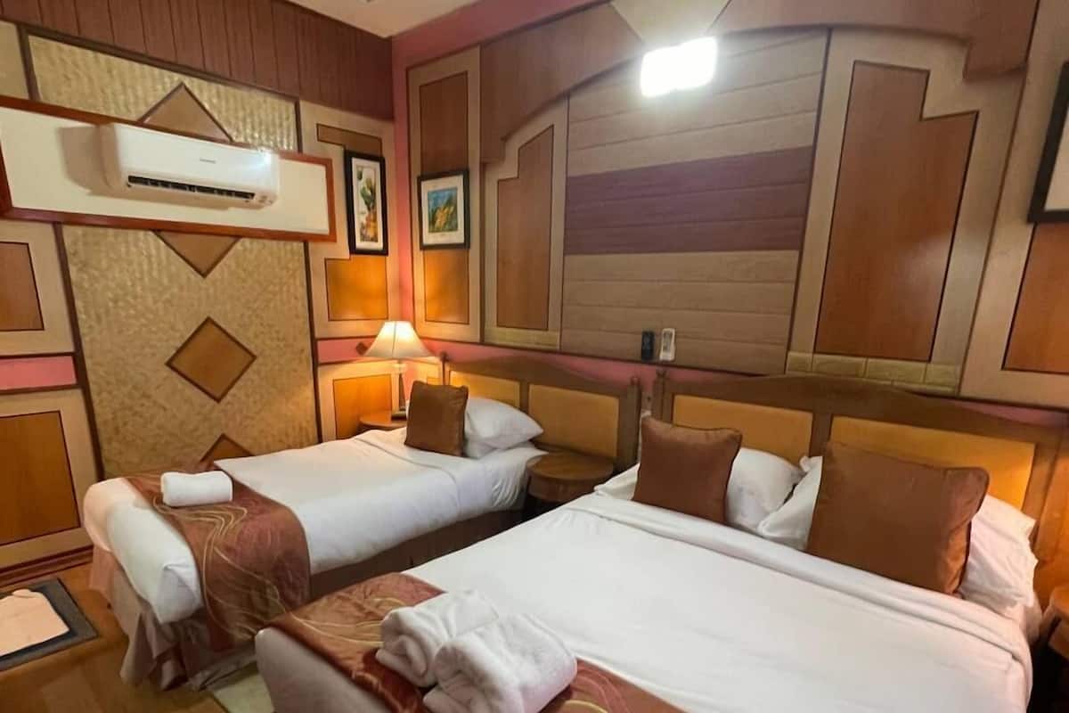 Triple Room | 1 bedroom, bed sheets