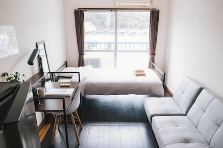 Standard Studio, Balcony, City View | Individually decorated, individually furnished, desk, laptop workspace. Osaka English House