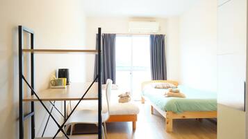 Standard Twin Room, Balcony, City View | Individually decorated, individually furnished, desk, laptop workspace