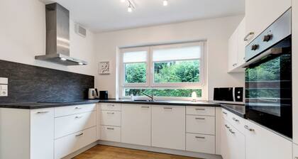 Ferienhaus 'Haus 15' mit gemeinsamer Terrasse, gemeinsamem Garten und Wi-Fi