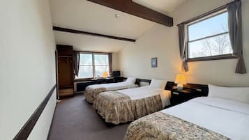 Triple Room (Reservations available for 3 or more guests) Non Smoking | Desk, laptop workspace, blackout drapes, iron/ironing board