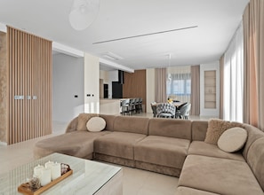 House (Five Bedroom House with Balcony) | Living room | 32-inch flat-screen TV with cable channels