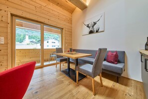 Comfort Apartment, 2 Bedrooms, Mountain View | Living area | 50-inch flat-screen TV with cable channels - Bocks Apartments 53C (Dalaas)