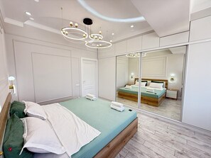 2 habitaciones, tabla de planchar con plancha, wifi y ropa de cama 