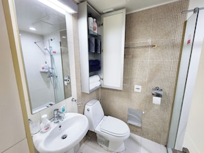 Shower, hair dryer, towels, soap