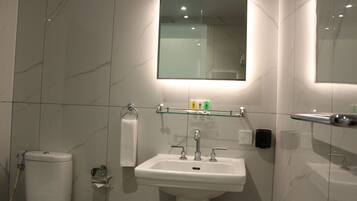 Shower, free toiletries, slippers, soap