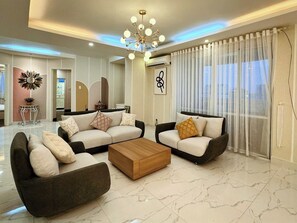 Deluxe Apartment, City View | Living area - 9Trip Stay in Central Garden - District 1 (Ho Chi Minh City)