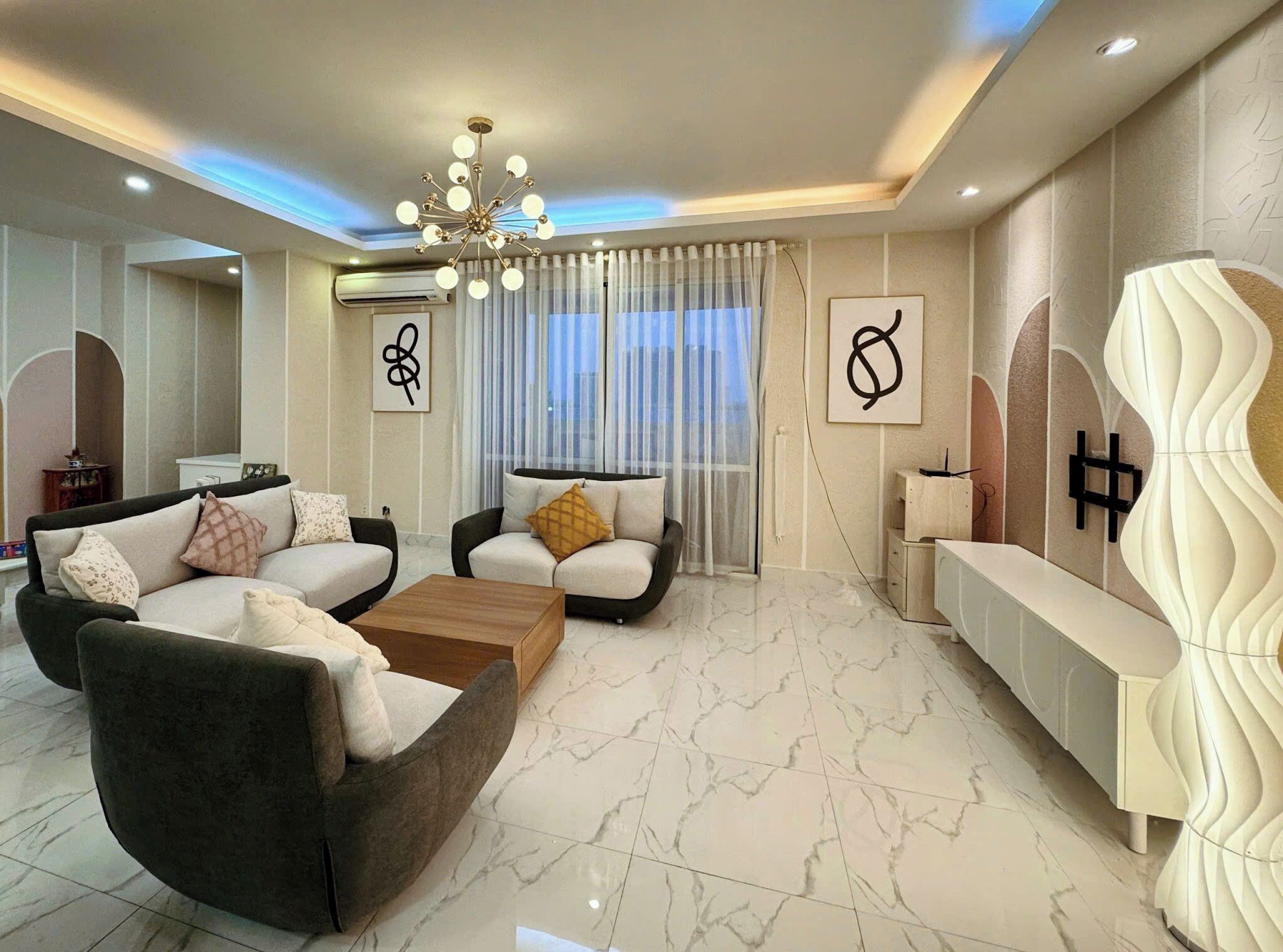Deluxe Apartment, City View | Living area | Flat-screen TV