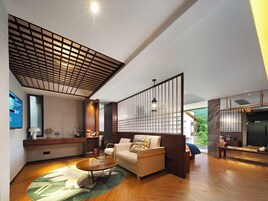 Luxury Suite, Bathtub, Mountain View | Living area | LCD TV, printers