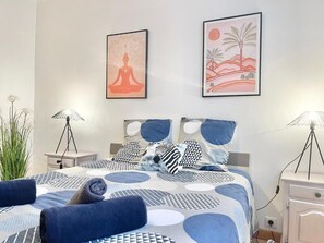 3 bedrooms, desk, iron/ironing board, travel cot