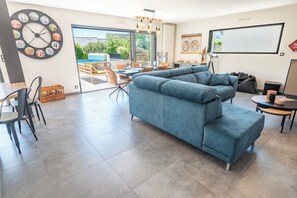 Smart TV, DVD player, foosball, books