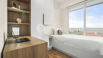 Apartment, 3 Bedrooms, City View | Laptop workspace, iron/ironing board, free WiFi