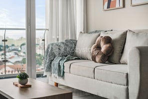 Apartment, 3 Bedrooms, City View | Living area | 43-inch Smart TV with cable channels, Netflix, streaming services