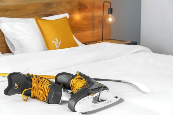 Habitació triple Deluxe, vistes a la ciutat | Escriptori i espai de treball apte per a portàtils 