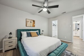 1 bedroom, desk, iron/ironing board, travel crib