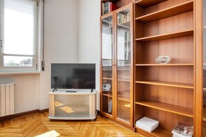 Comfort Apartment, City View | Living area | 27-inch LED TV with digital channels