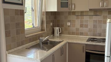 Fridge, oven, electric kettle, toaster