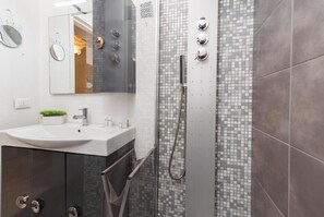Shower, bidet, towels, soap