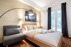 Apartment, 1 Bedroom, Kitchen, City View | Blackout drapes, iron/ironing board, free WiFi