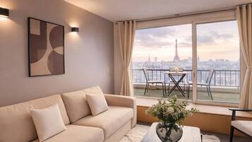 Deluxe Studio, City View | Living area | 72-cm flat-screen TV with digital channels