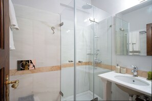 Standard Double Room | Bathroom | Shower, hair dryer, slippers, towels