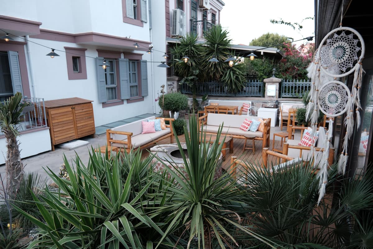 Comfort Double Room, City View | Living area | 21-inch LCD TV with satellite channels