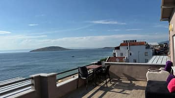 Luxury Quadruple Room, Sea View | Terrace/patio