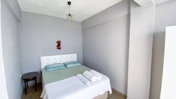 Chambre Triple Familiale, vue mer | Minibar, Wi-Fi gratuit, draps fournis
