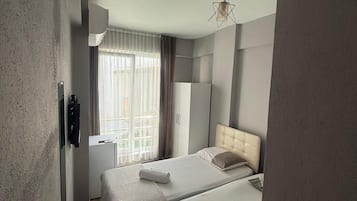 Standard Twin Room | Minibar, free WiFi, bed sheets