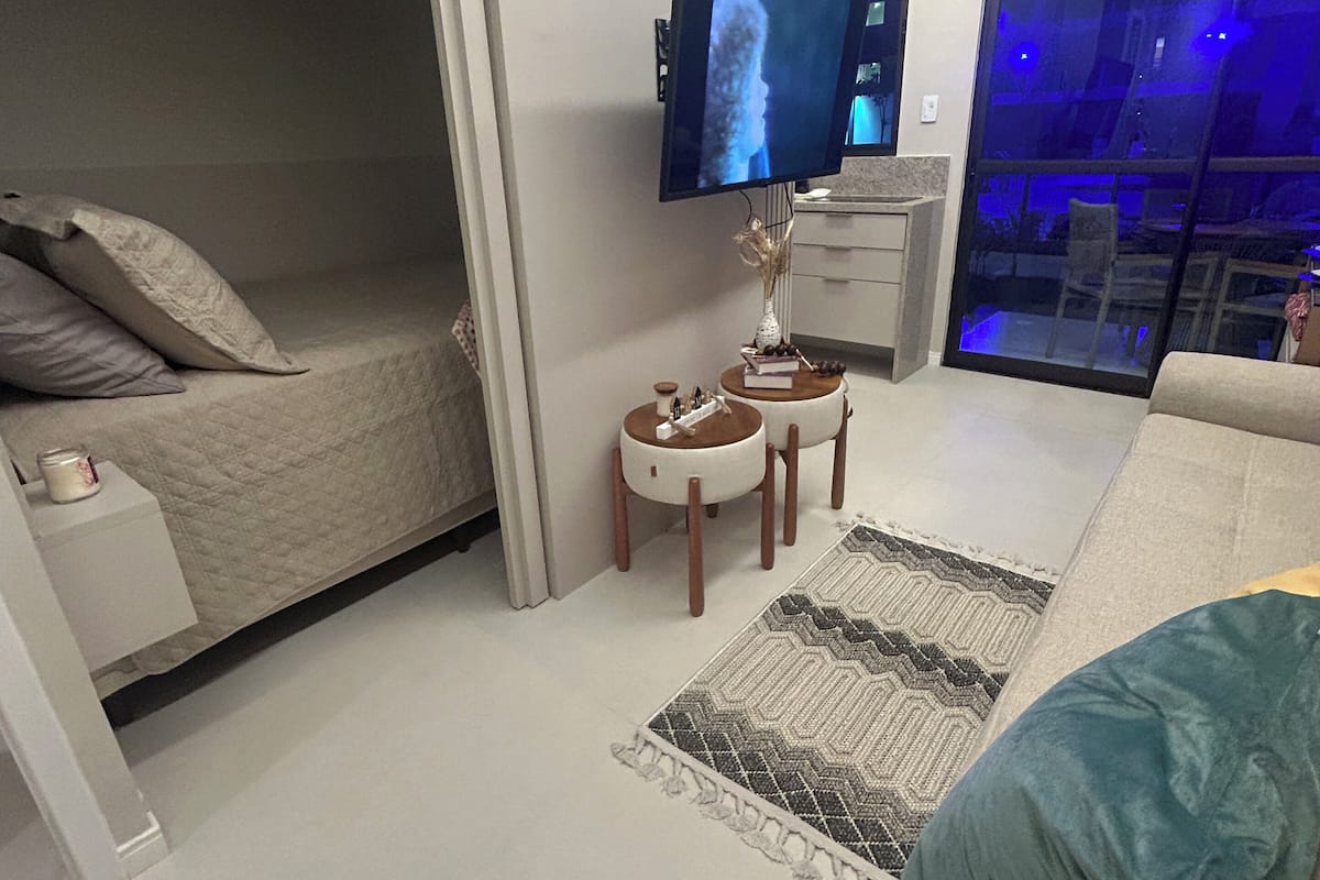 Family Studio, 1 Double Bed with Sofa bed, Pets Not Allowed, Pool View | Living area | 43-inch LED TV with digital channels, Netflix, streaming services