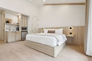 Tabla de planchar con plancha, cuna de viaje, wifi y ropa de cama