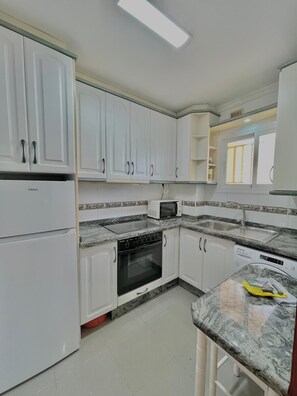 Fridge, microwave, oven, coffee/tea maker