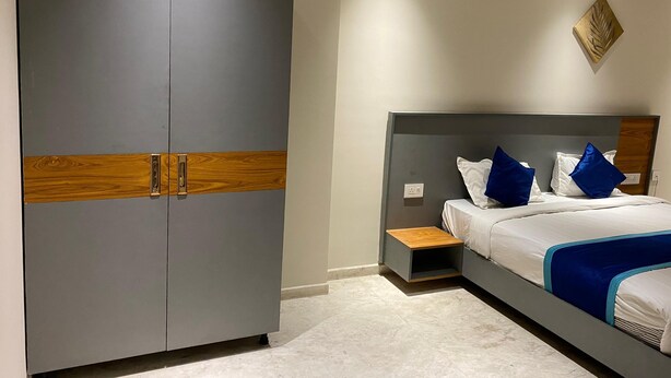 Deluxe Double Room | Desk, laptop workspace, blackout drapes, iron/ironing board - Raahgir Suites (Noida)