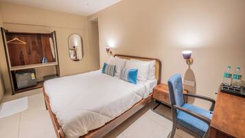 Family Room, 1 Bedroom, City View | In-room safe, desk, laptop workspace, iron/ironing board