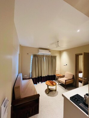 Family Room, 1 Bedroom, City View | In-room safe, desk, laptop workspace, iron/ironing board - Indie Stays Studio Kharadi (Pune)