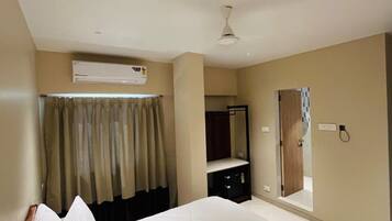 Deluxe Room, 1 Double Bed, City View | In-room safe, desk, laptop workspace, iron/ironing board