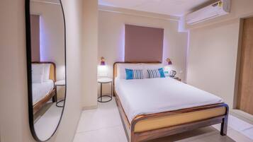 Deluxe Room, 1 Double Bed, City View | In-room safe, desk, laptop workspace, iron/ironing board