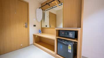 Deluxe Room, City View | In-room safe, desk, laptop workspace, iron/ironing board