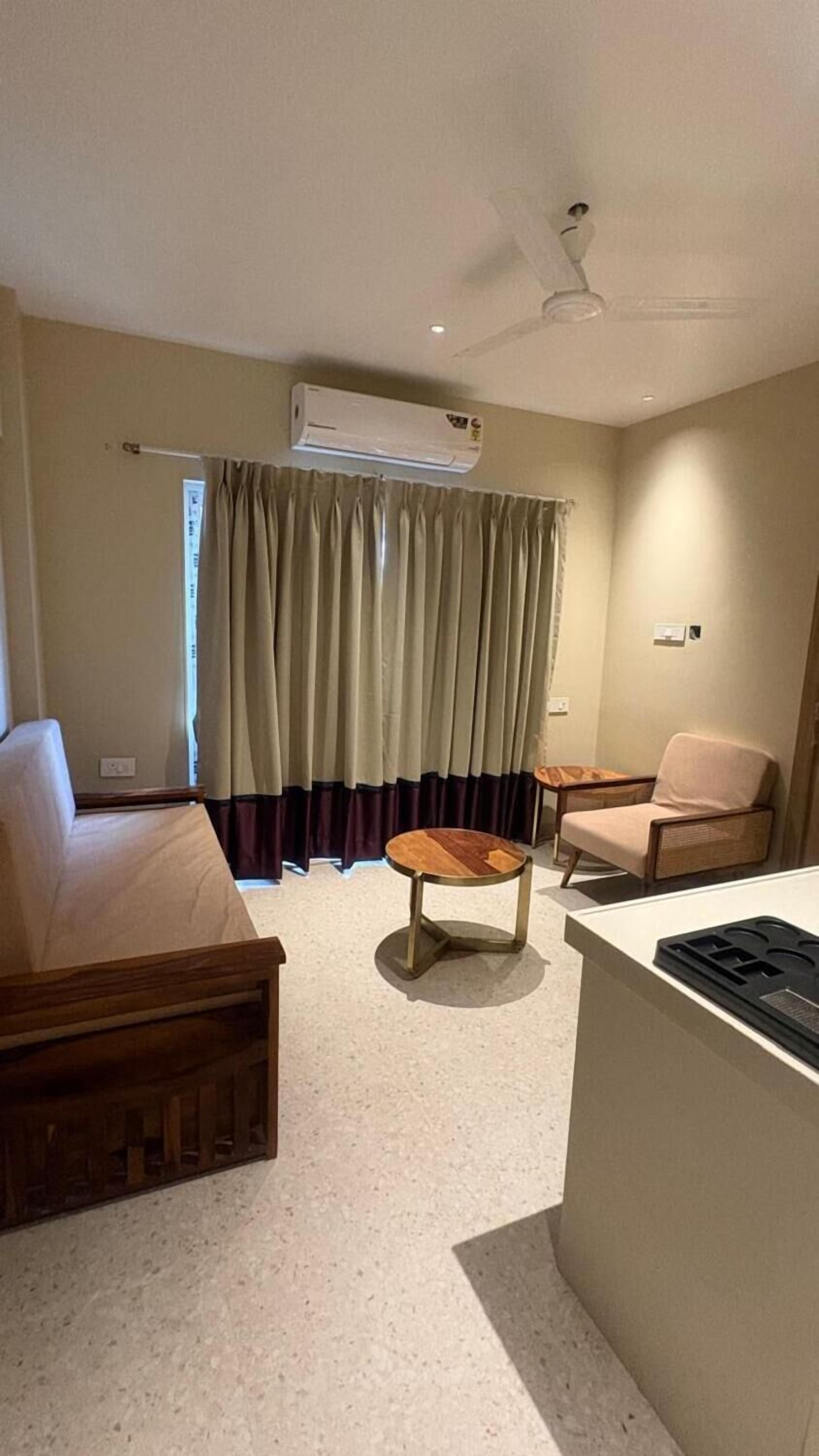 Family Room, 1 Bedroom, City View | In-room safe, desk, laptop workspace, iron/ironing board
