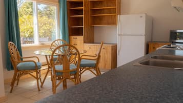 Signature Cottage | Living area | 32-inch LED TV with digital channels, streaming services, printers