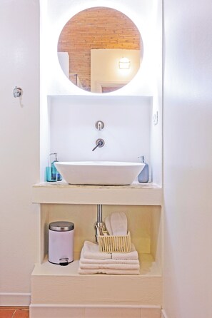 Hair dryer, towels, soap, toilet paper