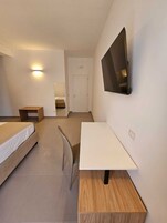 Superior Room, Balcony, City View | Desk, laptop workspace, blackout drapes, soundproofing